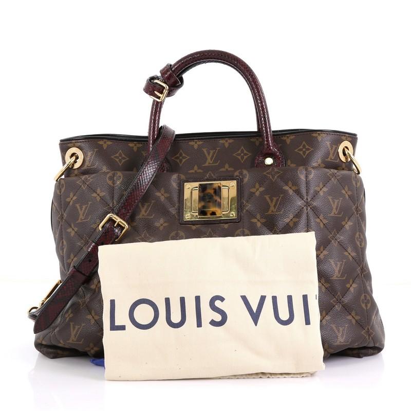 This Louis Vuitton Exotique Handbag Monogram Etoile GM, crafted from brown limited edition exotique etoile monogram coated canvas, features genuine python handles and gold-tone hardware. Its tortoise resin twist-lock closure opens to a dark brown