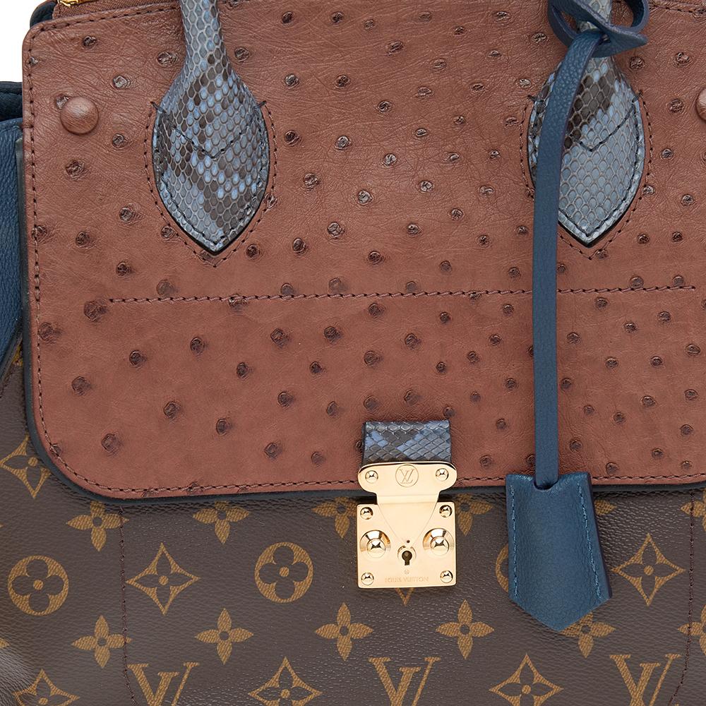 This special creation is for all Louis Vuitton collectors and lovers alike. Meticulously crafted from a combination of monogram canvas, leather, and ostrich skin, this dream bag is held by two snakeskin handles. Equipped with a spacious interior and