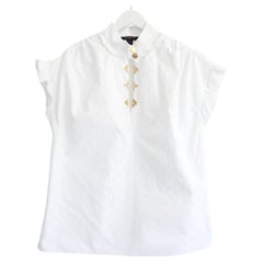 Louis Vuitton Otoño 2019 Blusa blanca con monograma y volante