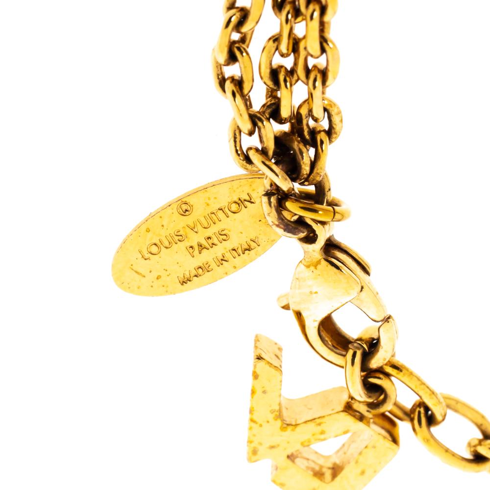 Louis Vuitton Faux Pearl Charm Gold Tone Chain Link Bracelet In Good Condition In Dubai, Al Qouz 2