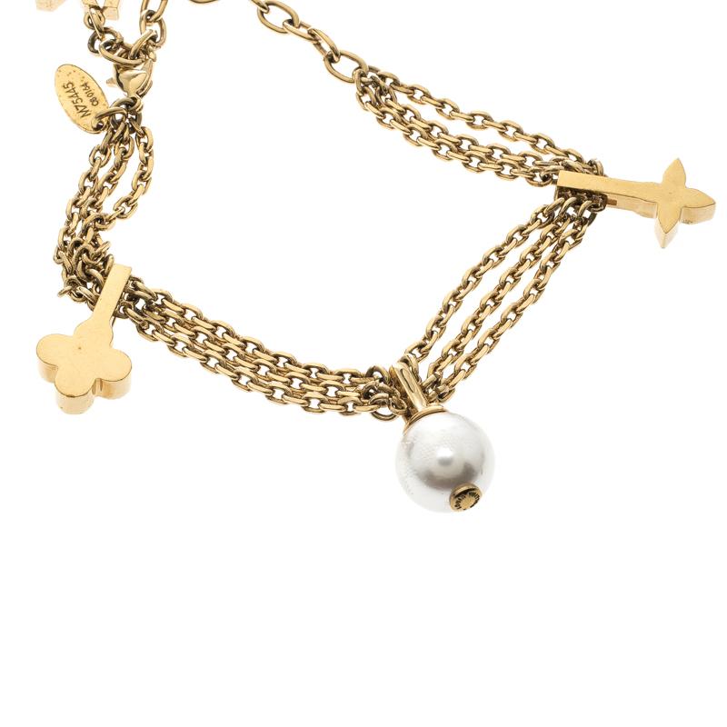 Contemporary Louis Vuitton Faux Pearl Gold Tone Charm Bracelet