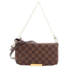 LOUIS VUITTON Favorite PM Bag in Damier Ebene Canvas