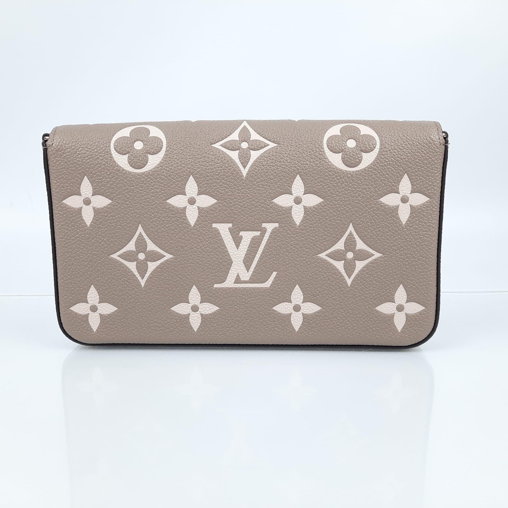 Women's Louis Vuitton Felicie clutch Monogram Empreinte embossed supple grained 