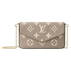 Louis Vuitton Felicie-Clutch mit Monogramm Empreinte in geprägter geschmeidiger Maserung 