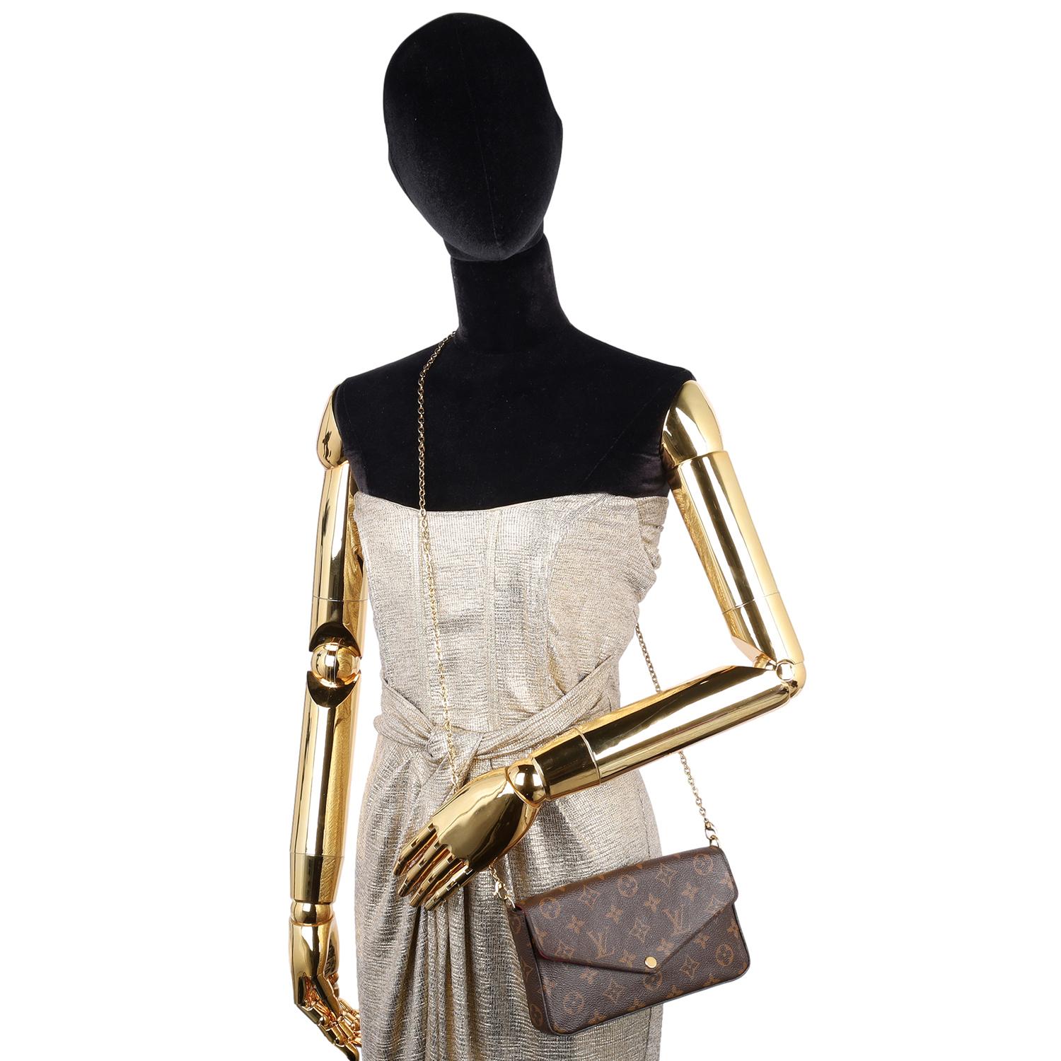 Authentic, pre-owned Louis Vuitton Felicie Monogram Canvas Pochette crossbody bag. This stylish bag features monogram coated canvas in brown. The bag features an optional polished brass chain-link shoulder strap and an envelope-style crossover flap
