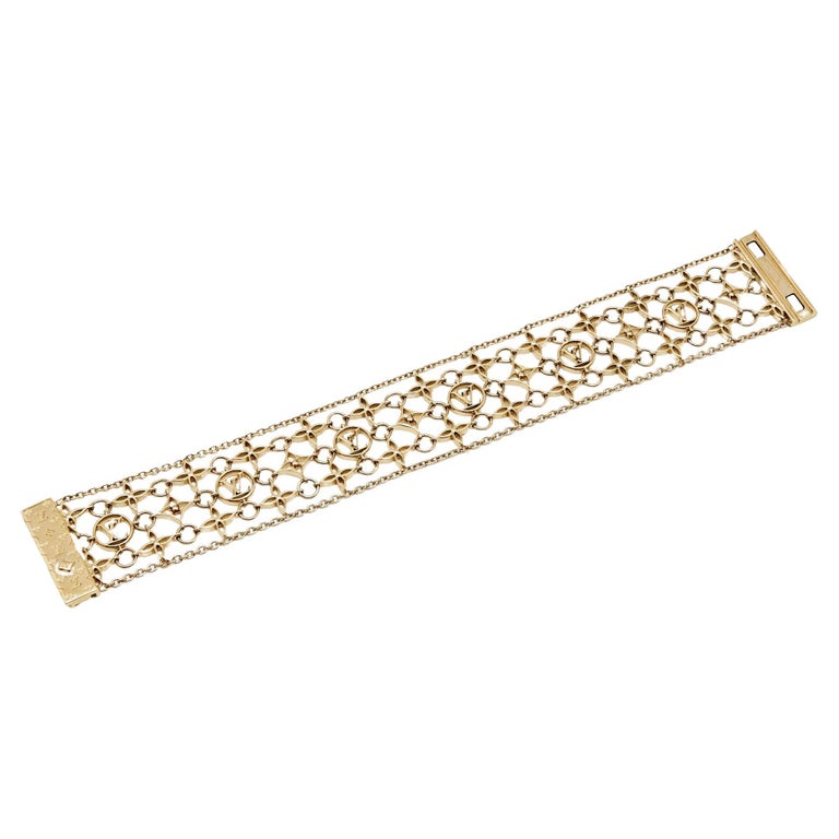 Louis Vuitton Filigram Gold Tone Bracelet M at 1stDibs  louis vuitton  bracelet, lv bracelet, vintage louis vuitton bracelet
