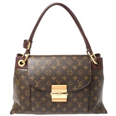 Used Louis Vuitton Flamme Monogram Canvas Olympe Bag