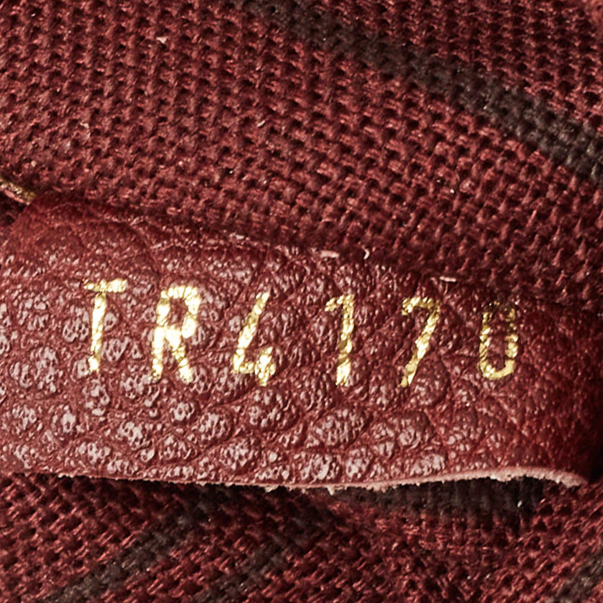 Louis Vuitton Flamme Monogram Empreinte Leather Petillante Clutch 2