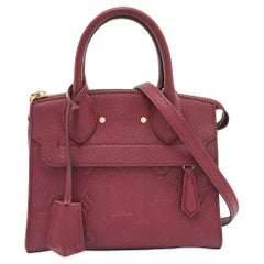 Louis Vuitton Flamme Monogram Empreinte Leather Pont Neuf Mini Bag