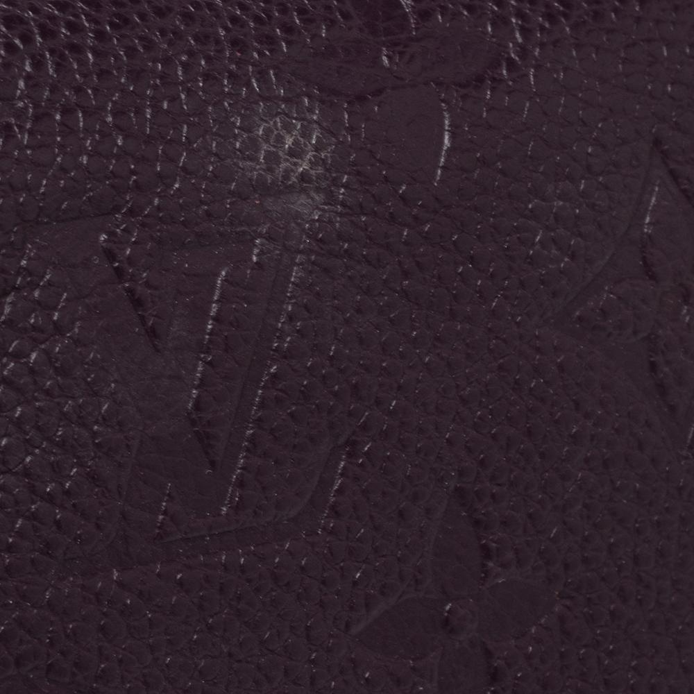 Louis Vuitton Flamme Monogram Empreinte Leather Sarah Wallet In Good Condition In Dubai, Al Qouz 2