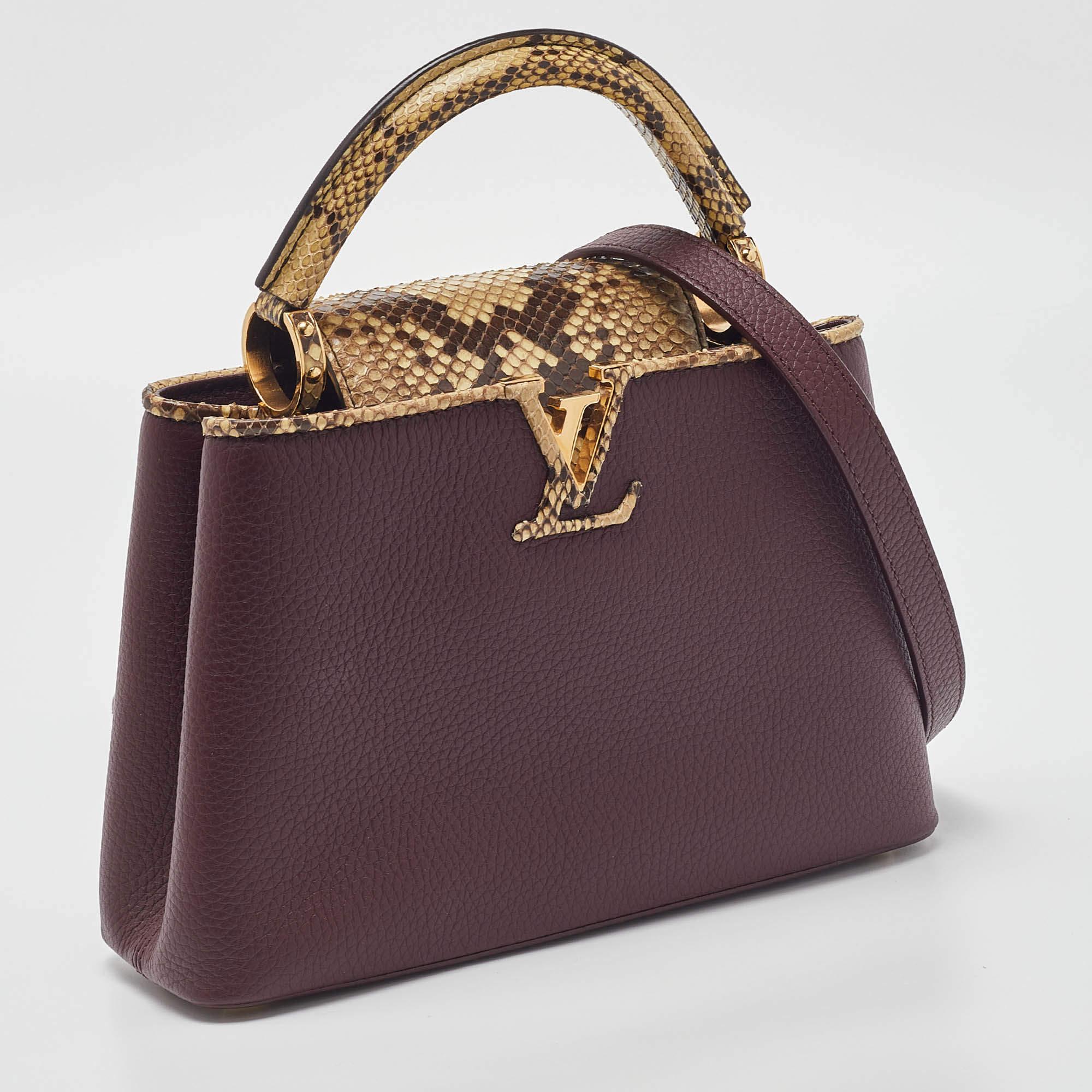 Crafted from leather, this LV Capucines BB features a structured design with a single python handle and protective metal feet. While the front LV elevates its beauty, the leather interior will dutifully hold all your daily essentials.

