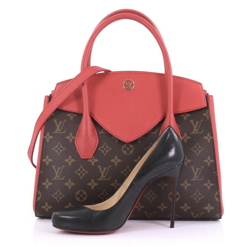 This Louis Vuitton Florine Handbag Monogram Canvas and Leather, crafted in brown monogram coated canvas, features dual rolled leather handles, red calf leather trim, LV logo at front, protective base studs, and gold-tone hardware. It opens to a red