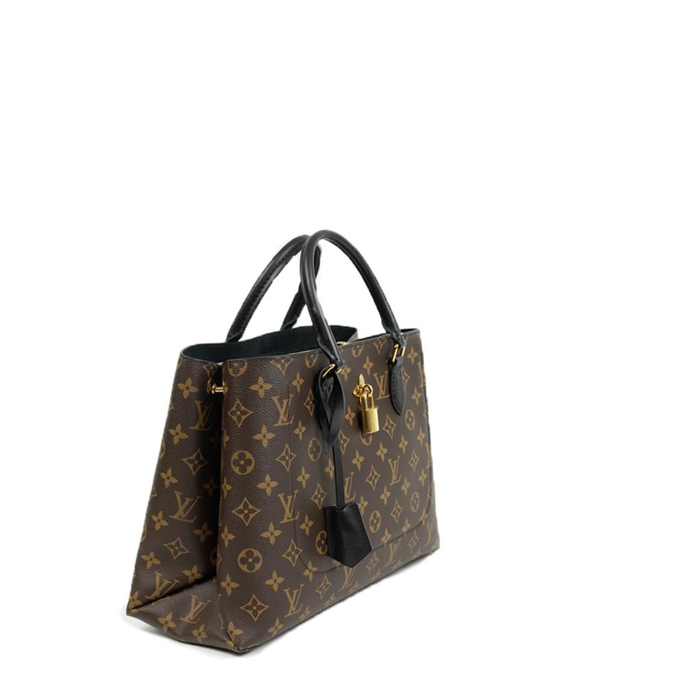 - Designer: LOUIS VUITTON
- Model: Flower tote
- Condition: Very good condition. Scratches on hardware, Minor sign of wear on base corners, Minor scuff on the front of th bag
- Accessories: Dustbag, Keys, Padlock
- Measurements: Width: 33cm, Height: