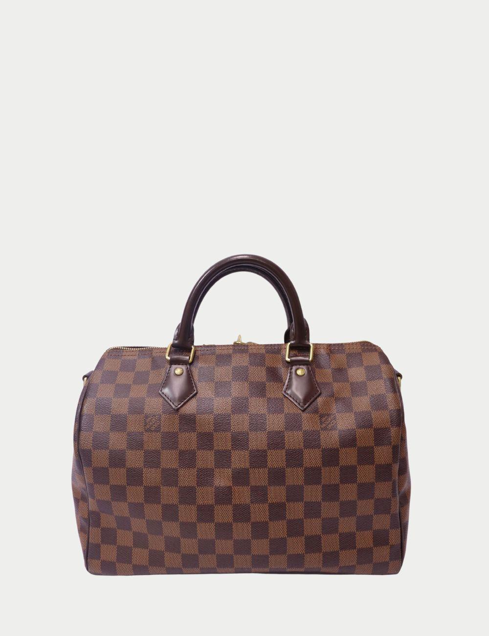 Louis Vuitton Damier Ebene Speedy Bandoulière 30


Véritable icône de la collection Louis Vuitton, le Speedy 30 en toile Damier Elegne est un sac à main intemporel conçu pour l'élégance au quotidien. Fabriqué en toile enduite durable et garni de