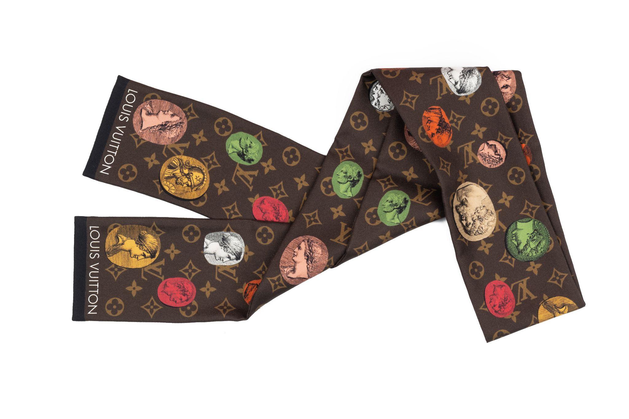 Beautiful, limited edition Louis Vuitton Fornasetti silk bandeau scarf. Never worn, comes with LV box.