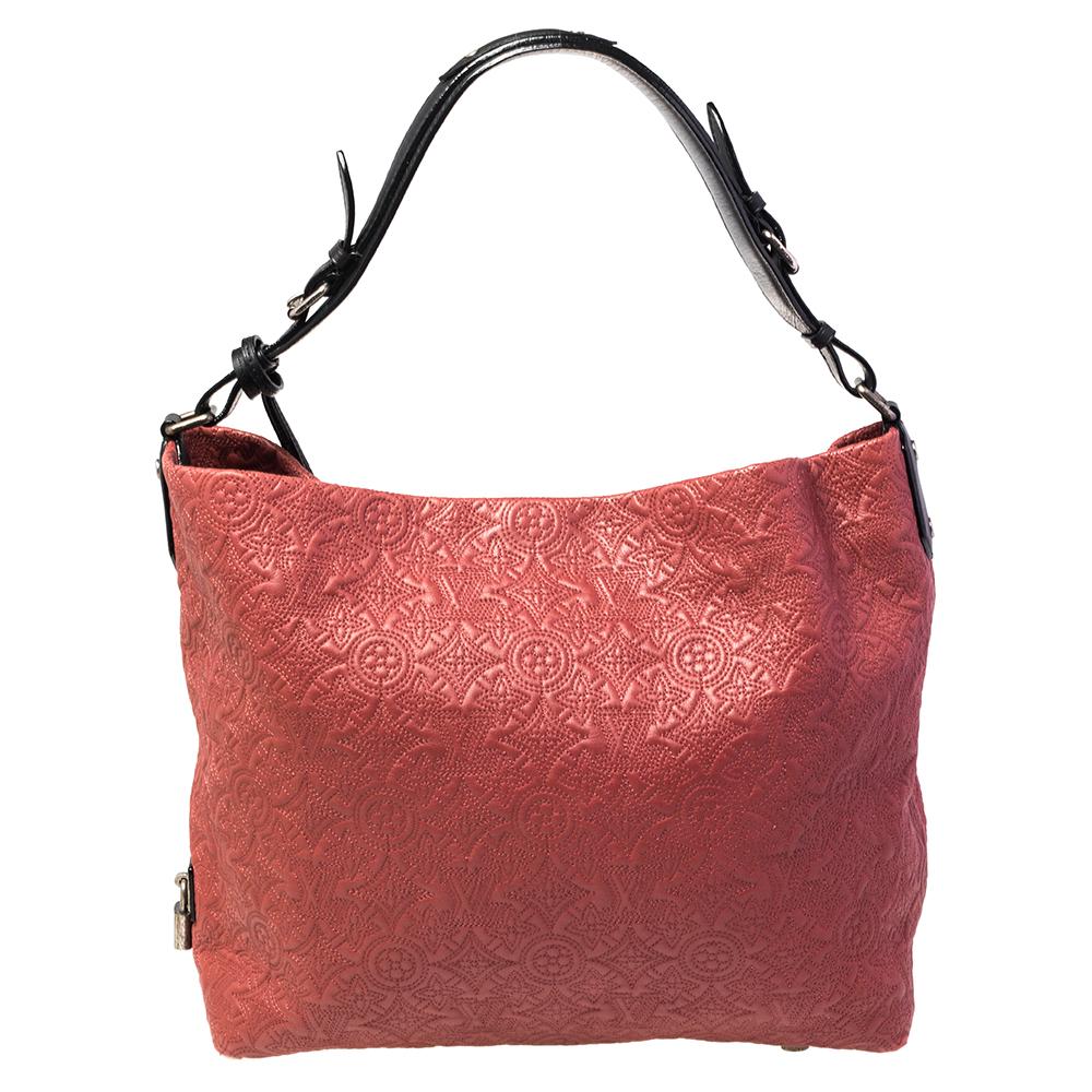 Louis Vuitton's handbags are popular owing to their high style and functionality. This Brode GM bag, like all the other handbags, is durable and stylish. Crafted from monogrammed leather, the pink bag can be paraded using the top handle. It is