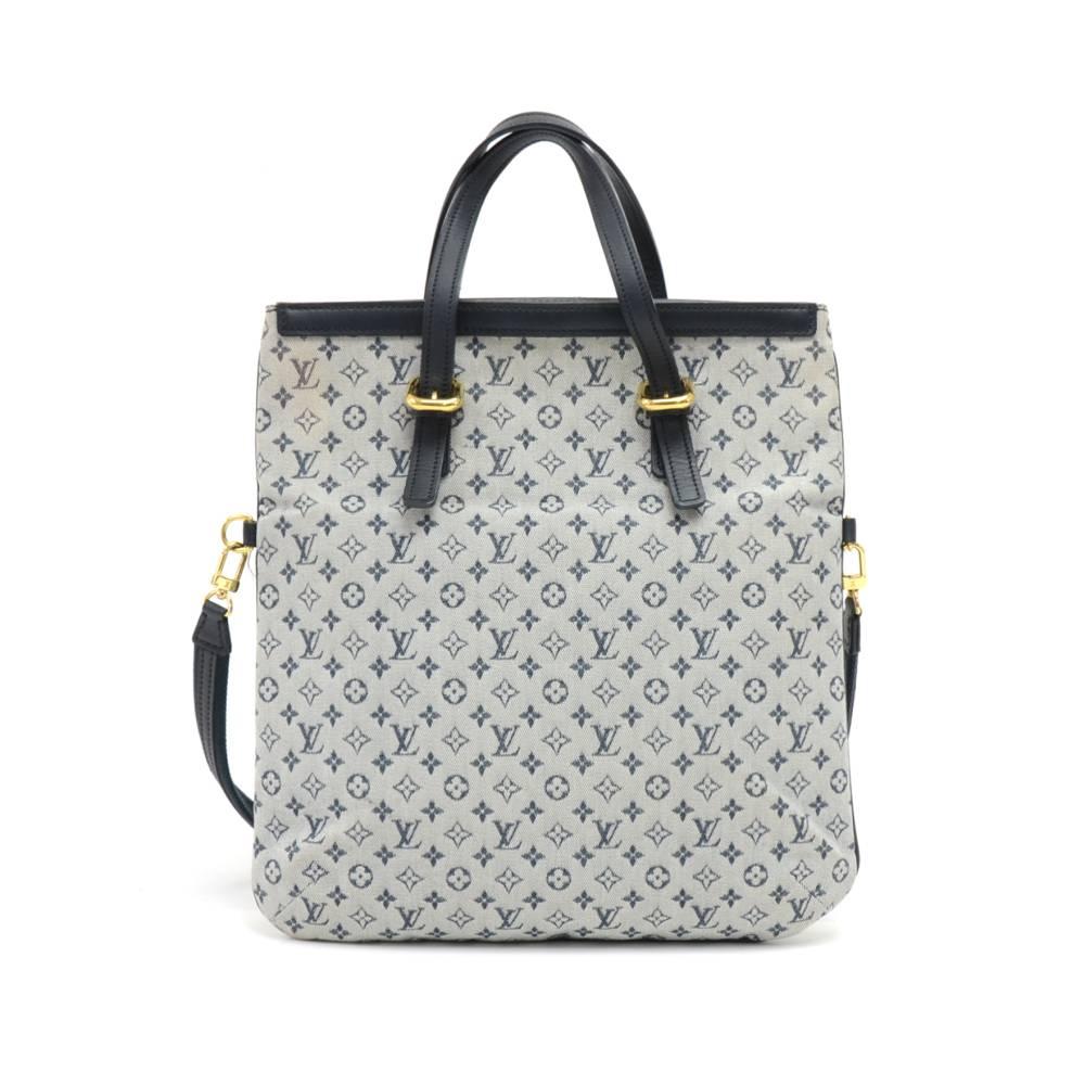 Louis Vuitton Francoise in blue Mini Monogram Canvas 2 Way tote bag.  It has lovely gold-tone hardware details. Inside has one zipper pocket. It comes with an adjustable/removable strap so it can be carried in hand as a tote, or folded over to be