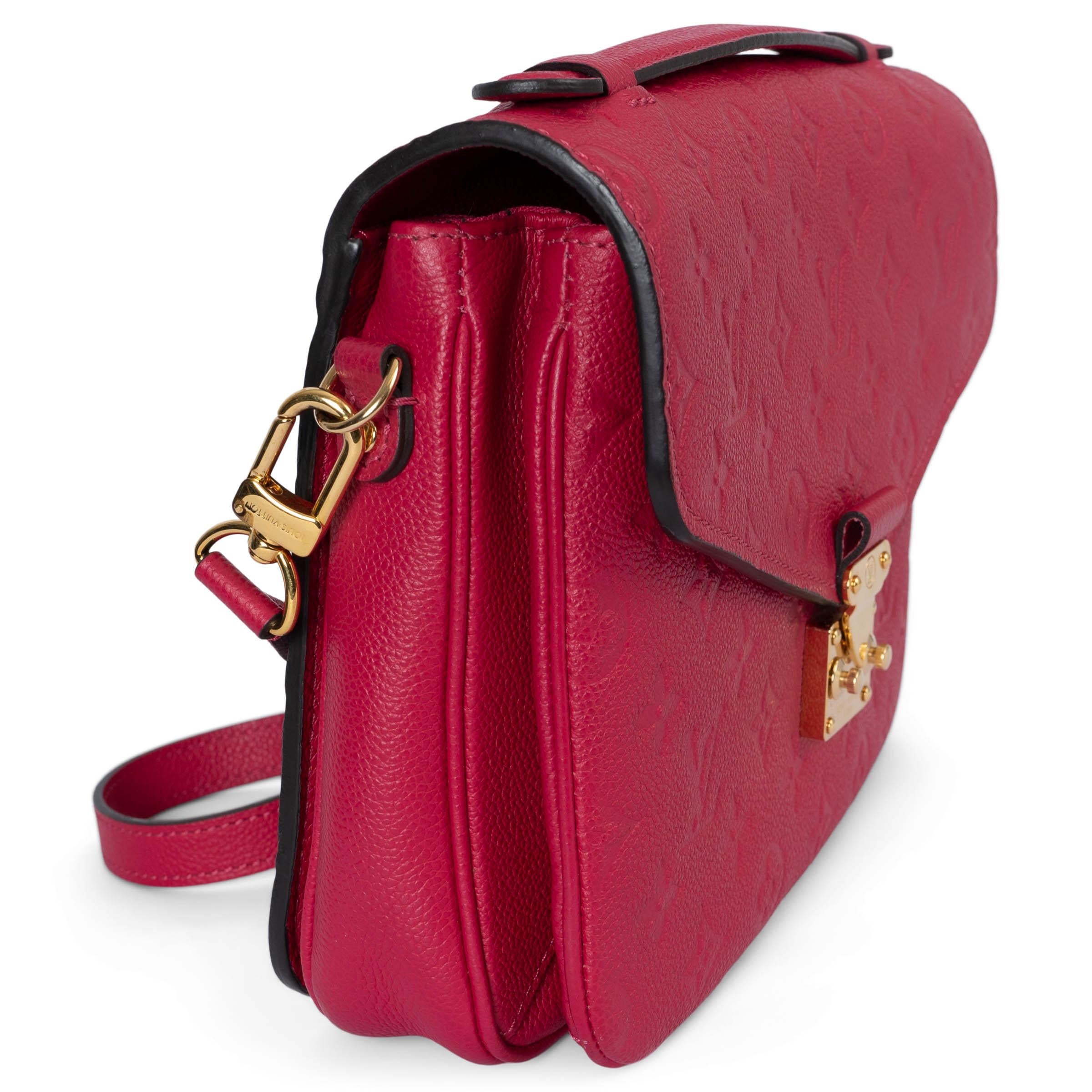 This 100% authentic Louis Vuitton Pochette Métis shoulder bag in stunning Freesia (fuchsia pink) Monogram Empreinte leather combines elegance with practicality. It features a convenient zipper pocket on the outside back and an adjustable, detachable