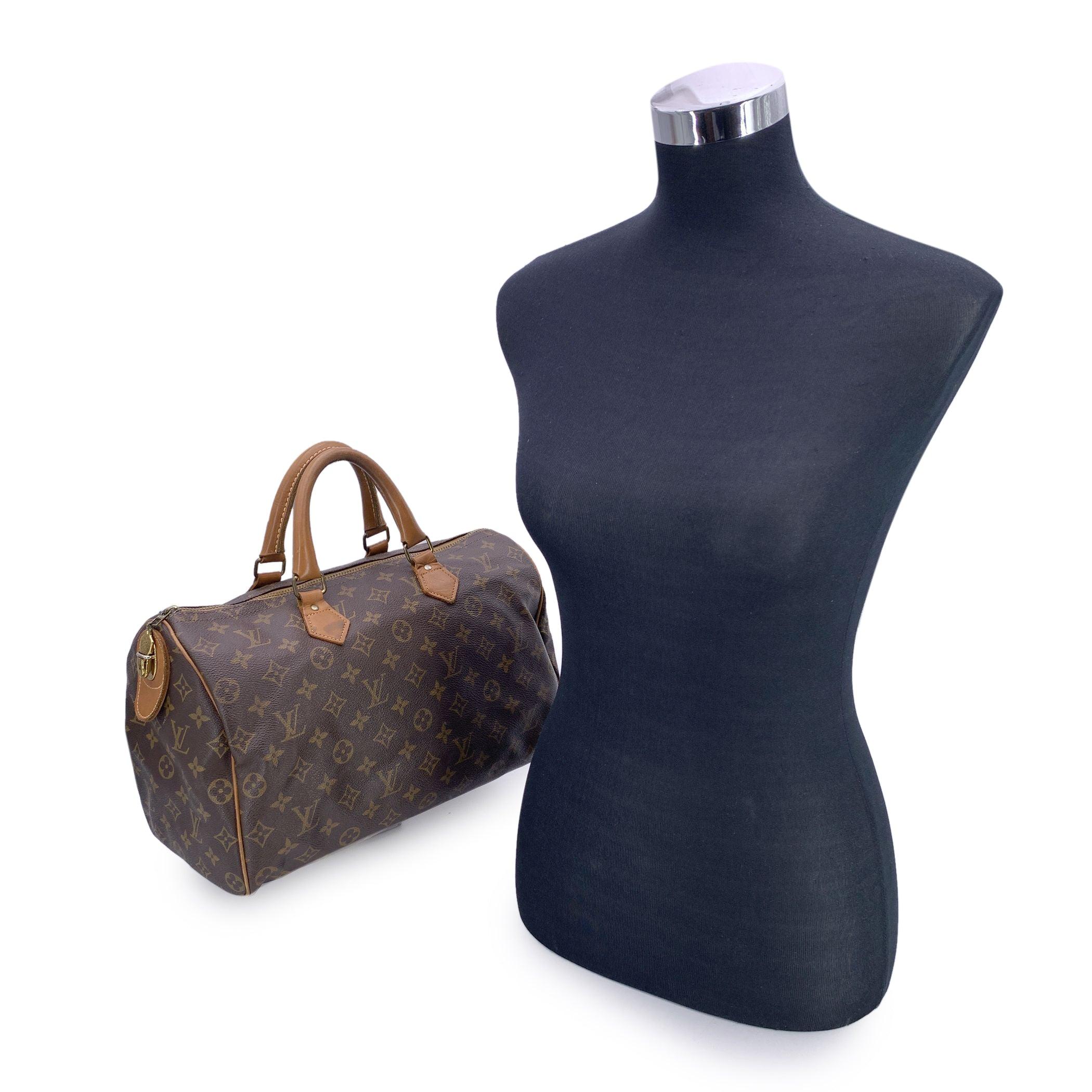 A rare and collectible piece of Louis Vuitton history, this Vintage Monogram 