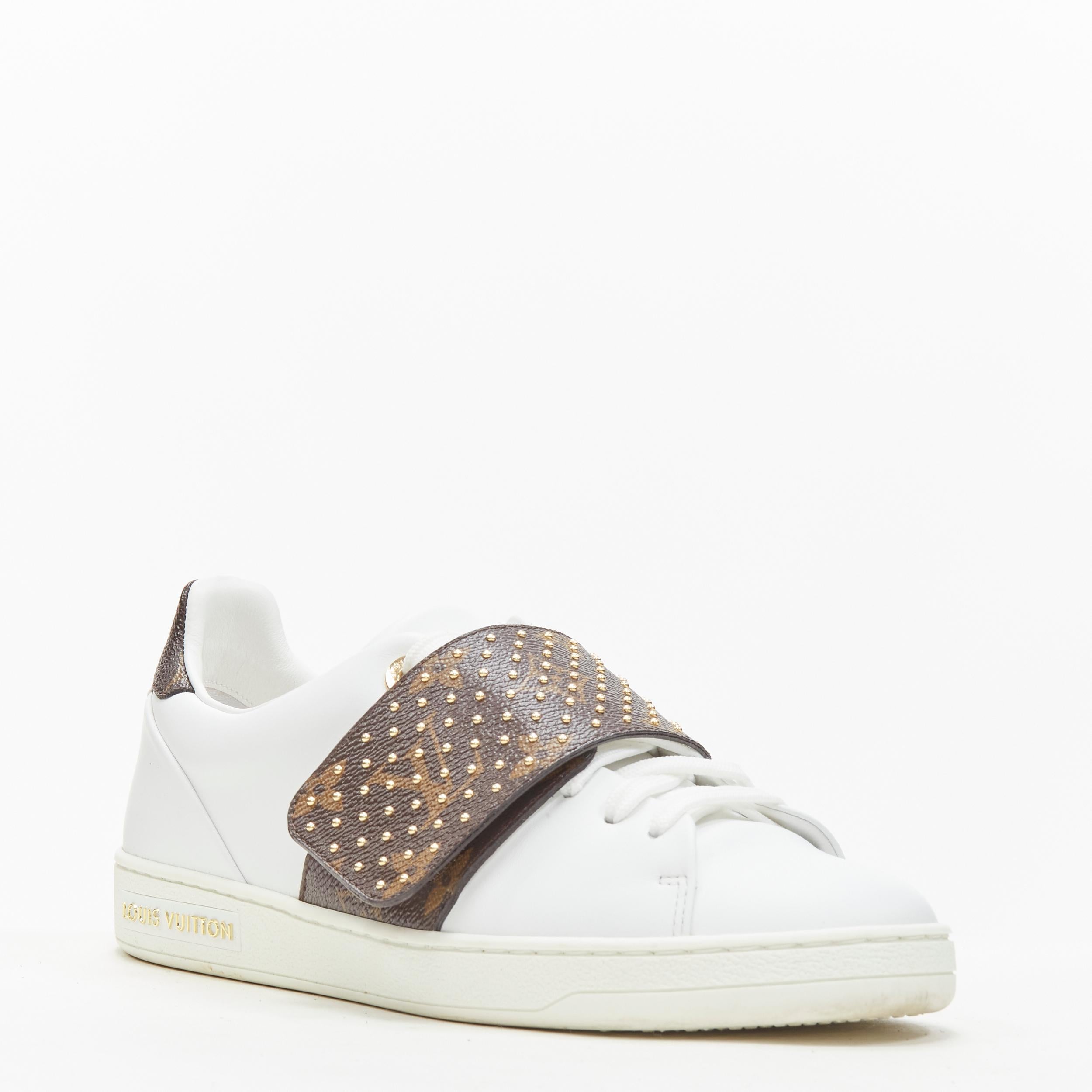 LOUIS VUITTON Front Row brown LV monogram gold stud white leather sneaker EU36 
Reference: ANWU/A00341 
Brand: Louis Vuitton 
Collection: Front Row 
Material: Leather 
Color: White. 
Pattern: Solid 
Closure: Magic Tape 
Extra Detail: Magic tape