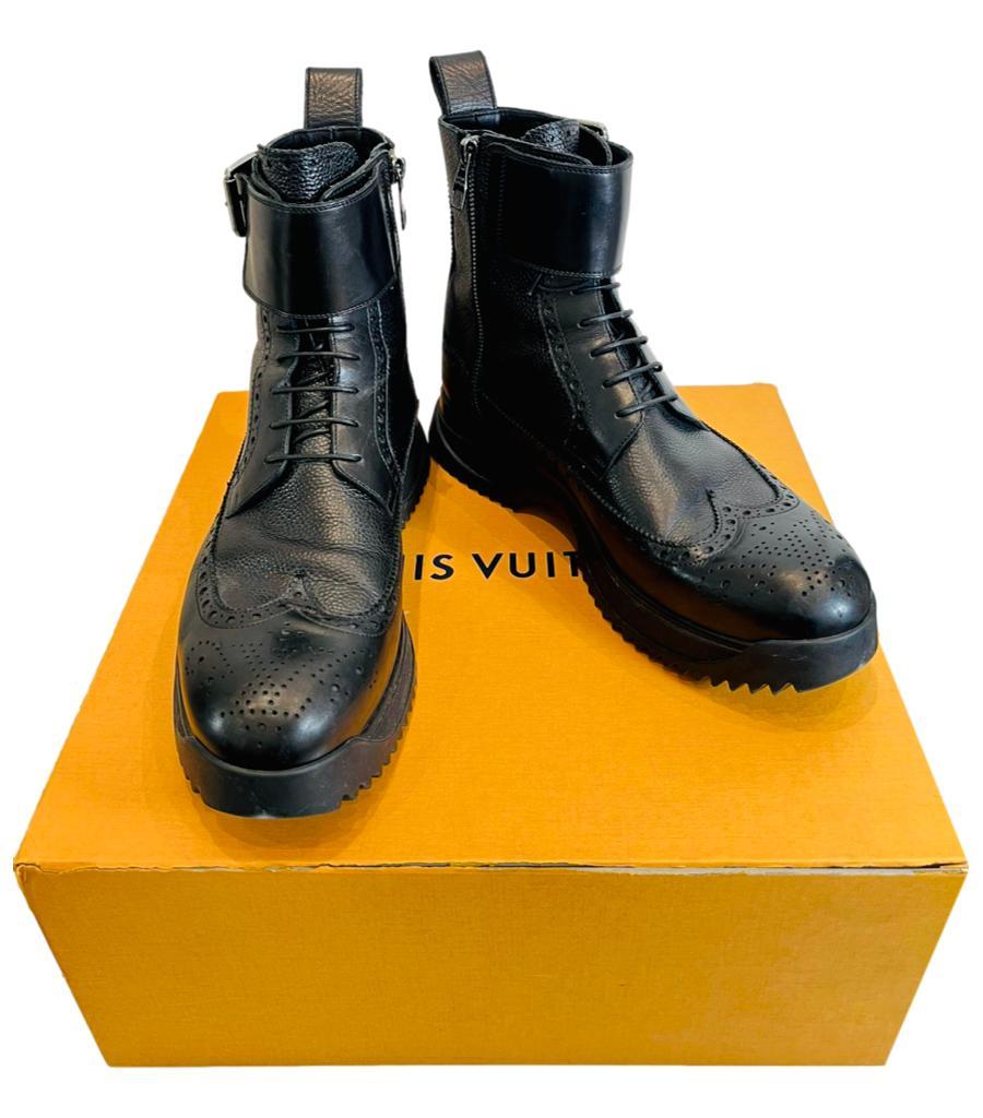 Louis Vuitton Frontier Leather Ankle Boots

Black lace-up chunky boots designed with high platform and buckle closure to the side.

Detailed with decorative perforations, round toe and pull-tabs.

Size – 8

Condition – Very Good

Composition –
