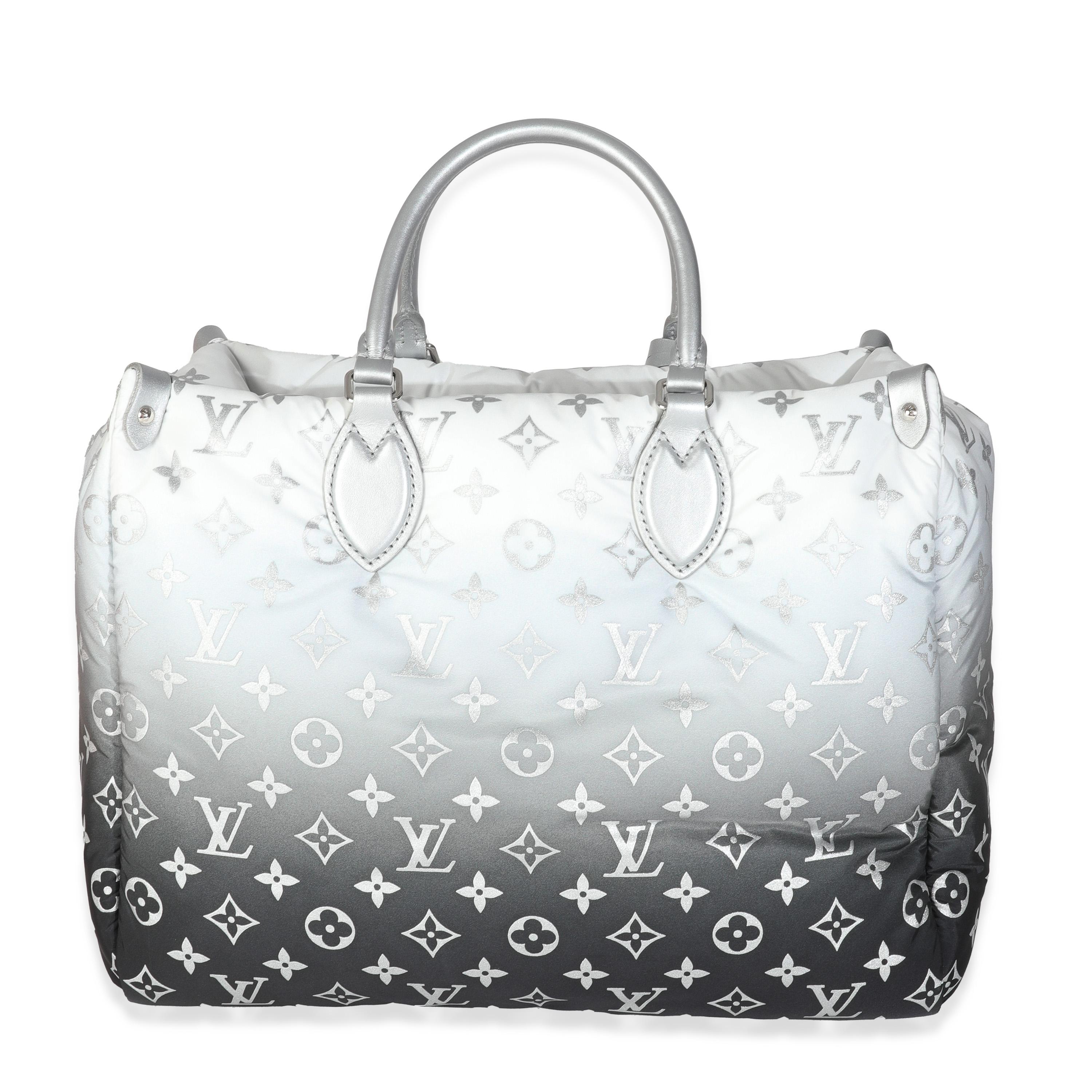 Listing Title: Louis Vuitton Frost Nylon Monogram Gradient LV Snow Onthego MM
SKU: Z147073
MSRP: 3800.00 USD
Condition: Pre-owned 
Condition Description: This bag says it all. The Onthego bag from Louis Vuitton is designed for busy lifestyles.