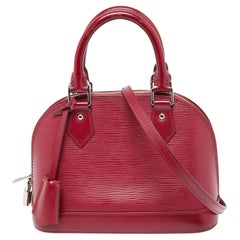 Used Louis Vuitton Fuchsia Epi Leather Alma BB Bag