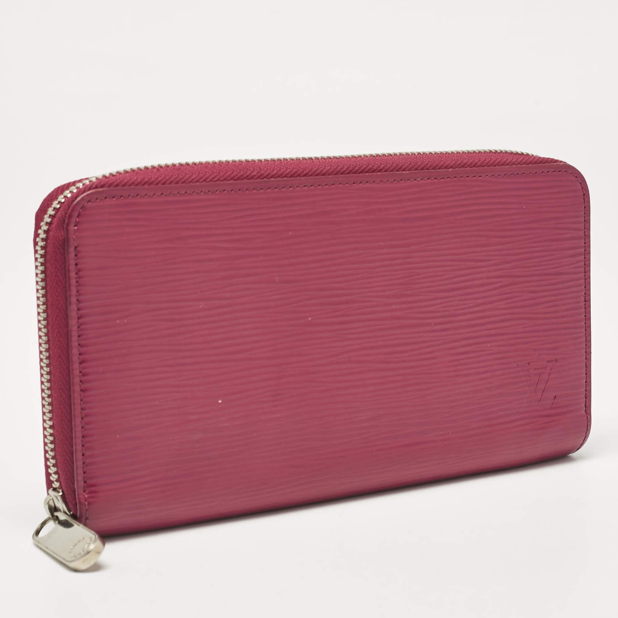 Portefeuille Zippy Louis Vuitton en cuir Epi fuchsia Pour femmes en vente