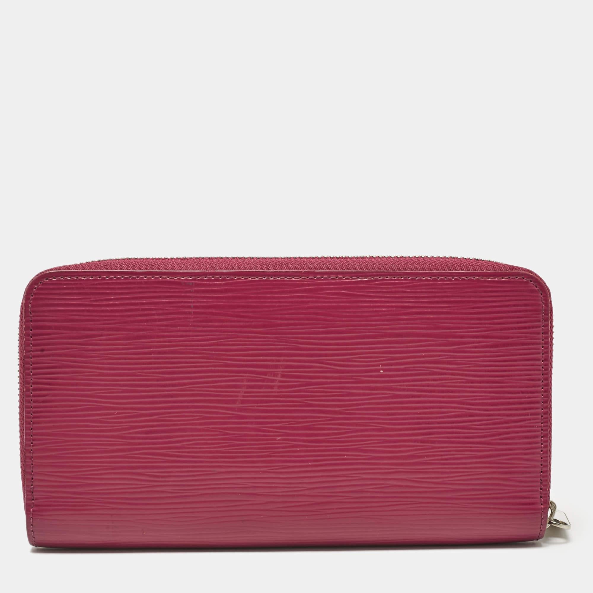 Portefeuille Zippy Louis Vuitton en cuir Epi fuchsia en vente 1