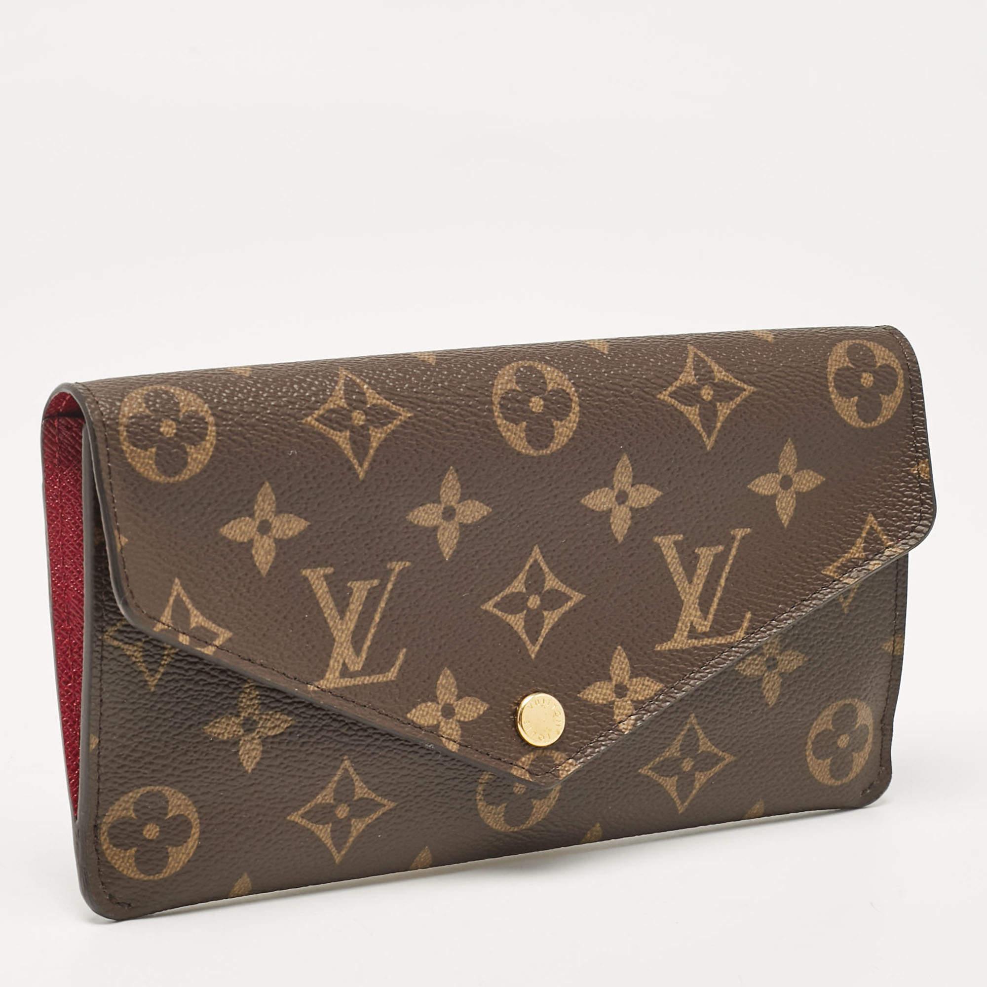 Marrone Louis Vuitton Portafoglio Jeanne in tela Monogram fucsia in vendita