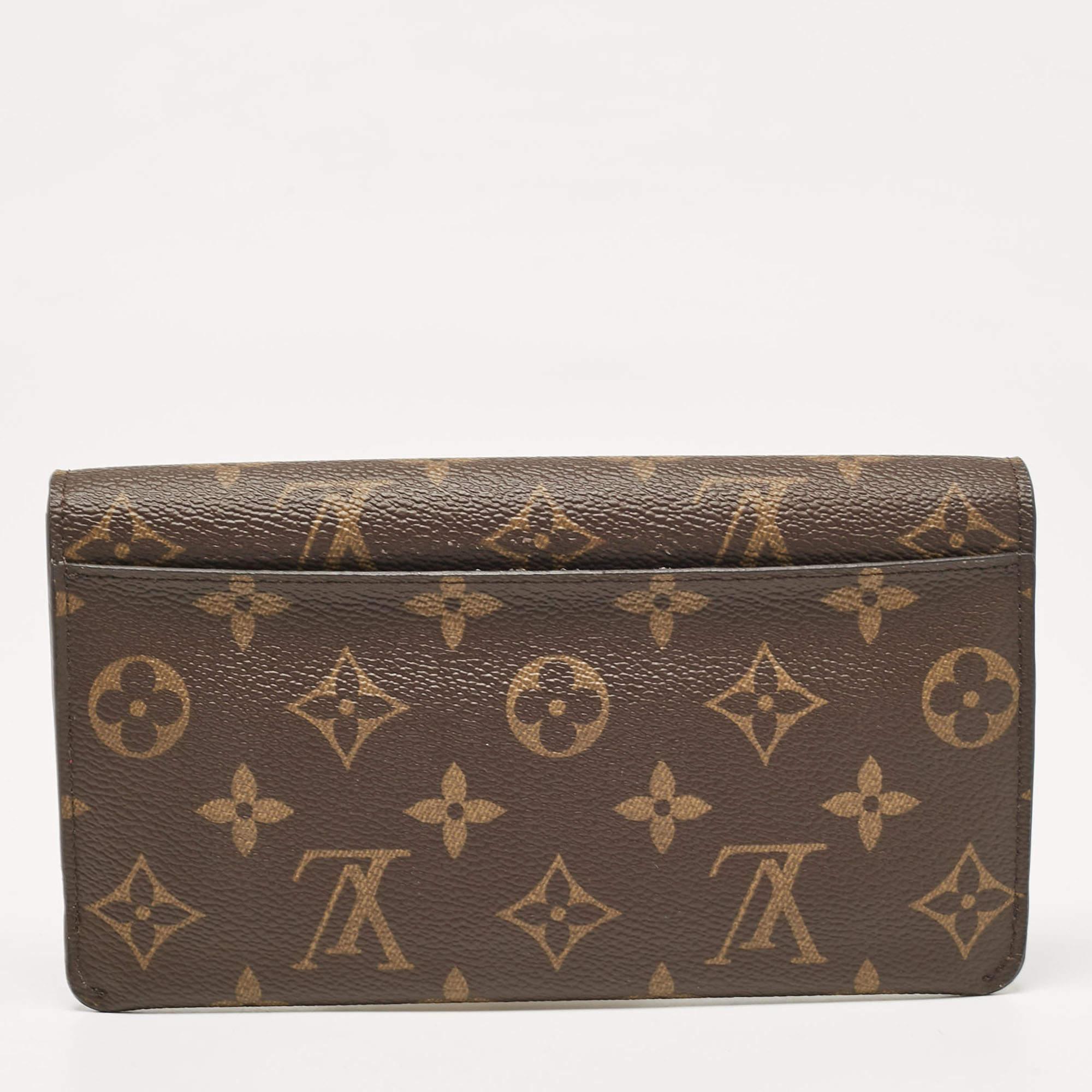 Louis Vuitton Portafoglio Jeanne in tela Monogram fucsia In condizioni buone in vendita a Dubai, Al Qouz 2