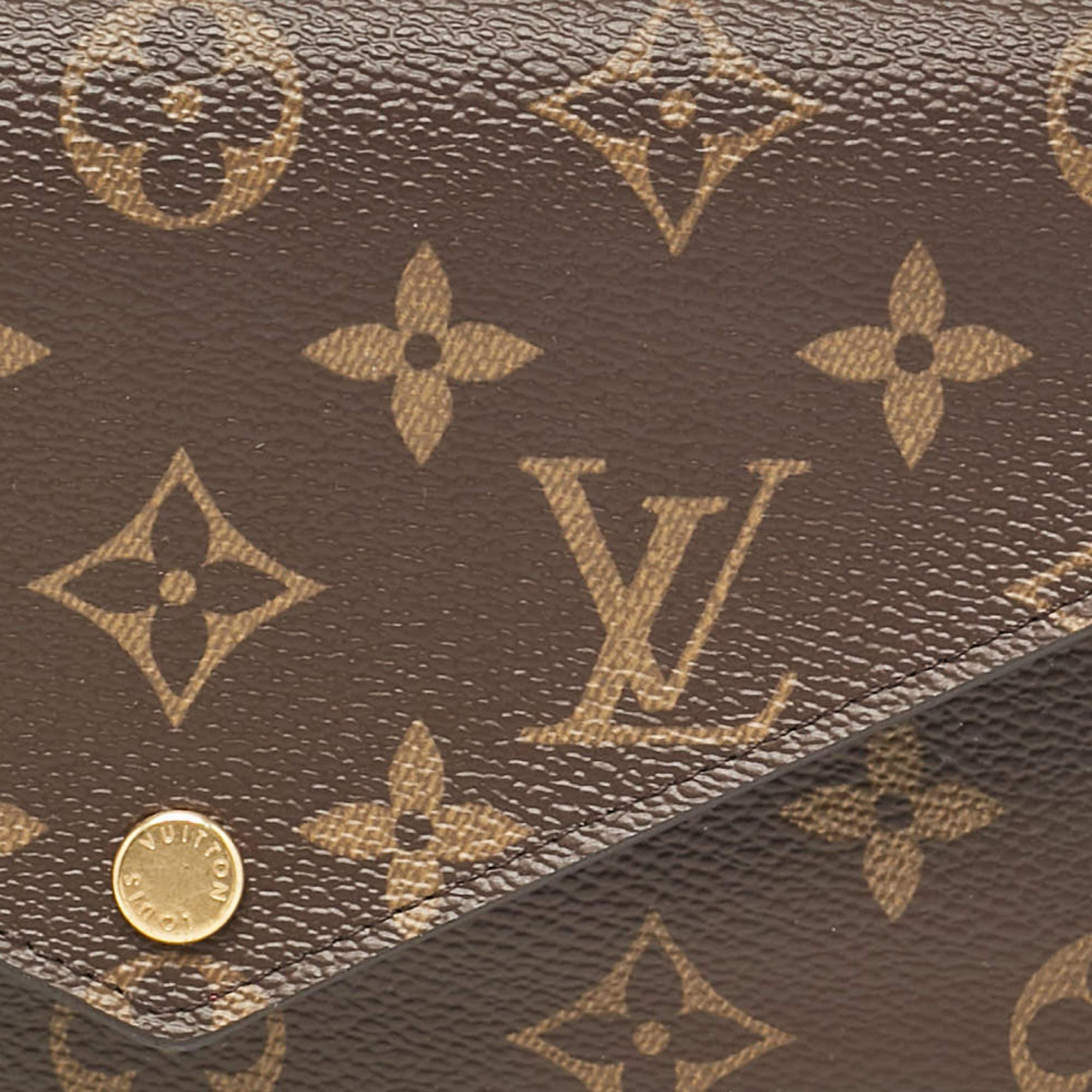 Donna Louis Vuitton Portafoglio Jeanne in tela Monogram fucsia in vendita
