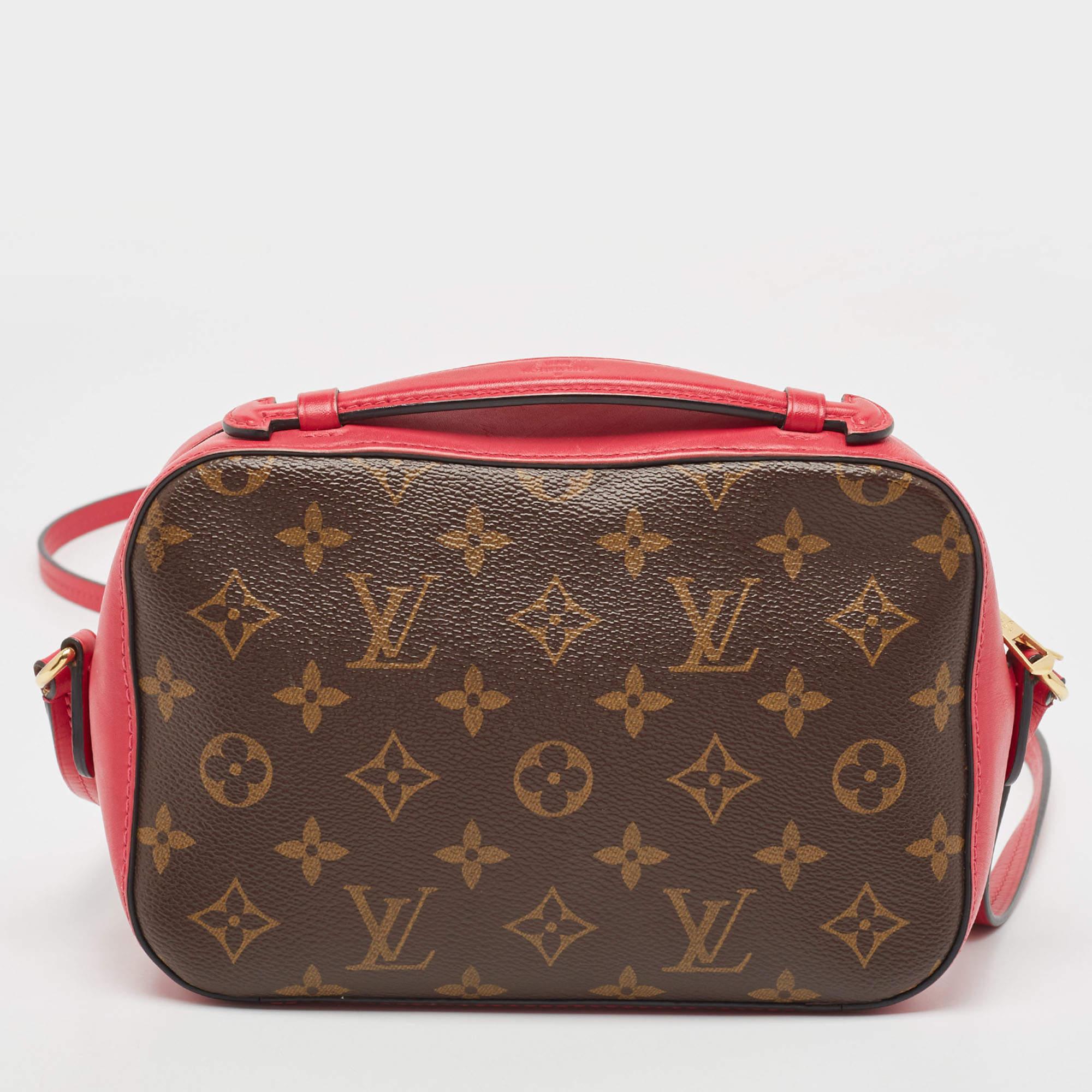 This elegant and versatile Saintonge crossbody bag is from the house of Louis Vuitton. It is crafted from monogram-coated canvas. The front of the bag is highlighted with a gold-tone accent attached for some extra character. Held by a top handle and