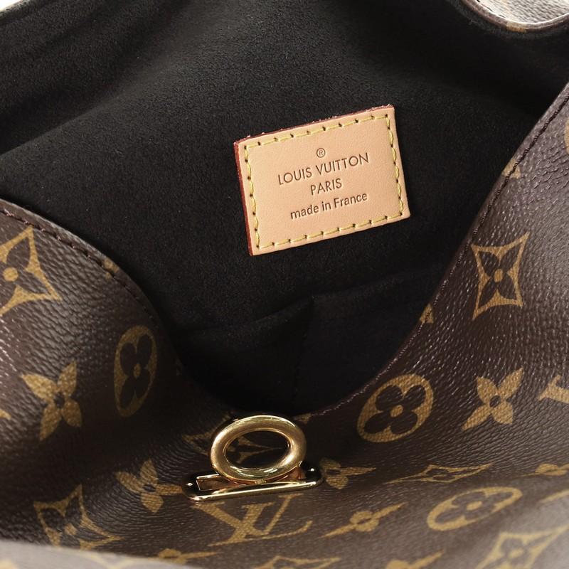 Louis Vuitton Gaia Handbag Monogram Canvas In Good Condition In NY, NY