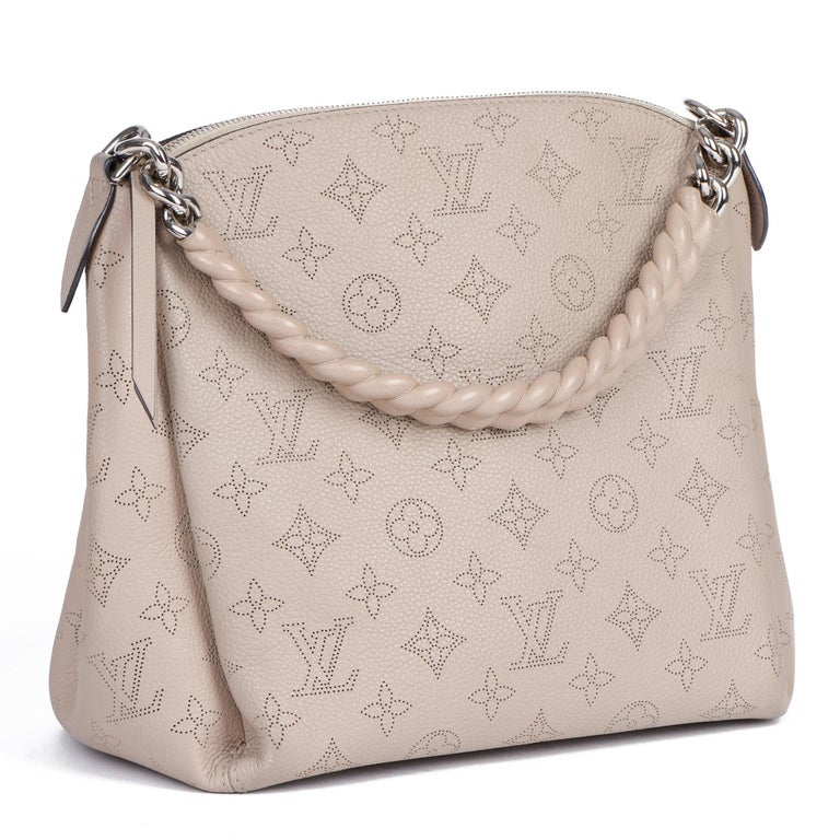 Louis Vuitton Beige Perforated Mahina Leather Babylone MM Galett Handb – On  Que Style