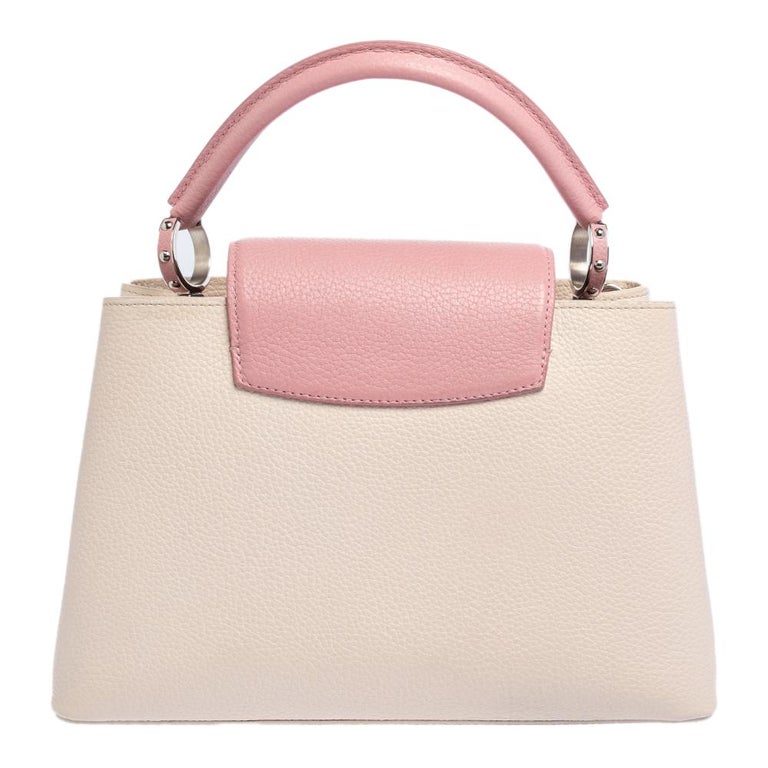 Louis Vuitton Pink Taurillon Capucines Wallet Leather Pony-style calfskin  ref.870934 - Joli Closet