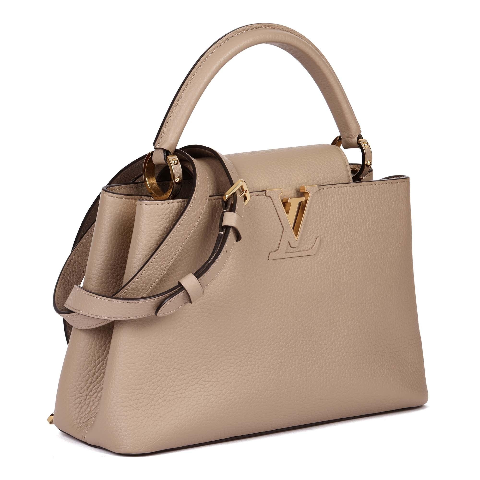 LOUIS VUITTON
Galet Taurillon Leather Capucines MM

Xupes Reference: HB4845
Serial Number: AR1169
Age (Circa): 2019
Accompanied By: Louis Vuitton Dust Bag, Shoulder Strap
Authenticity Details: Date Stamp (Made in France)
Gender: Ladies
Type: Top