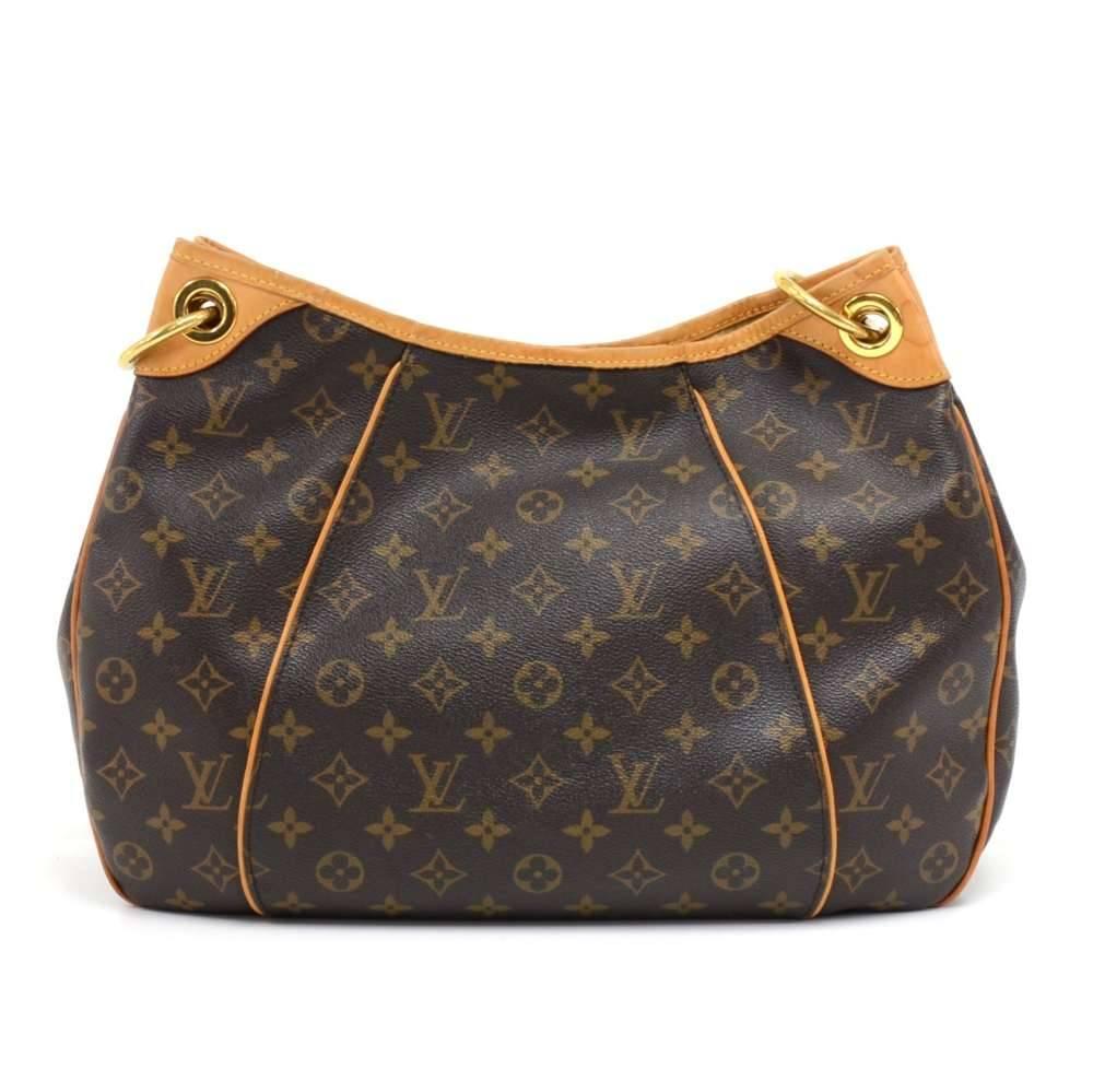 Louis Vuitton Galliera PM shoulder bag in monogram canvas. Outside has a stylish Gold-tone plate that is engraved with 