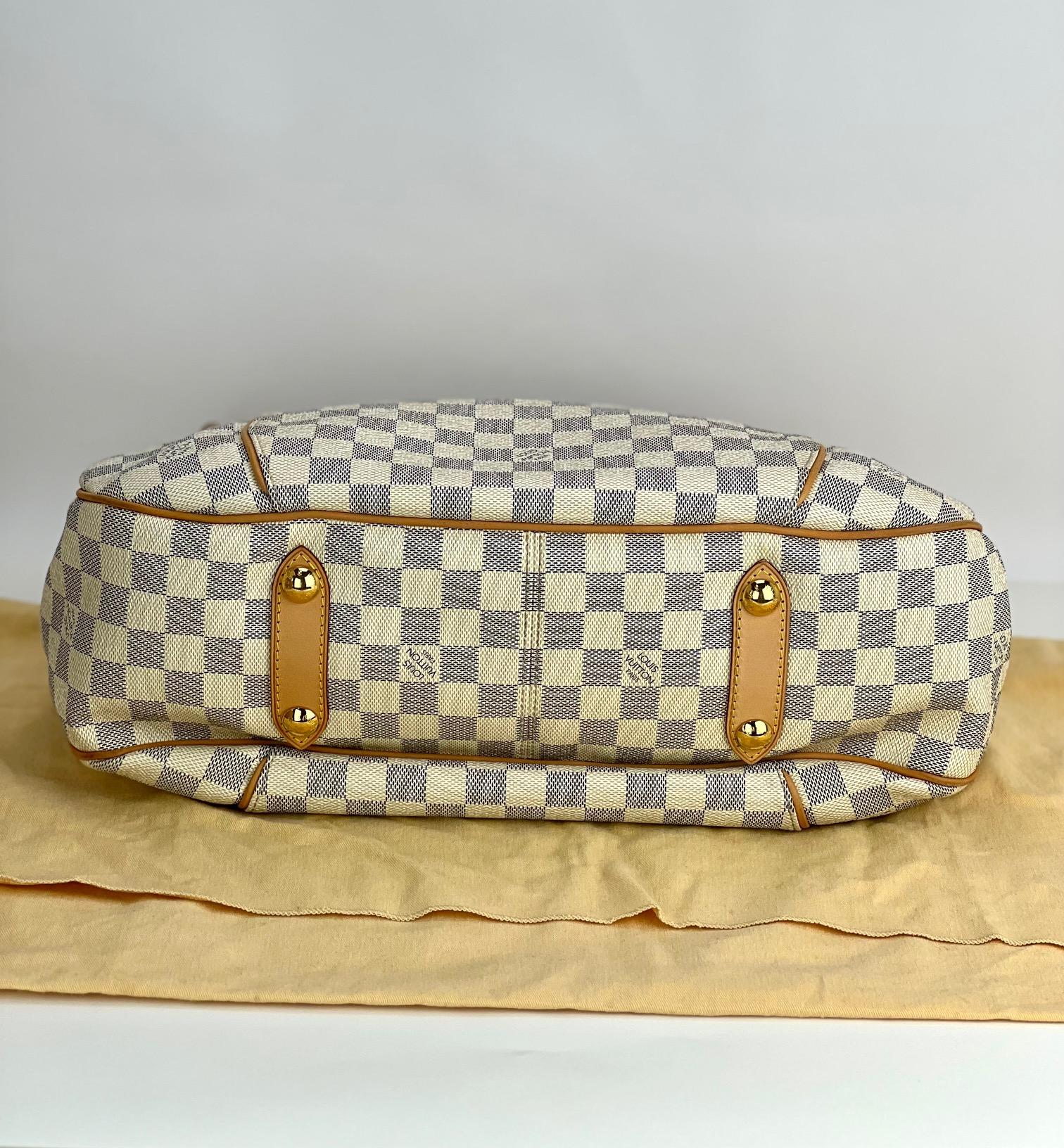 Pre-Owned  100% Authentic
Louis Vuitton Galliera PM Damier Azur
W/added insert to help keep shape
RATING: A/B   very good, well maintained,
shows minor signs of wear
MATERIAL: damier azur canvas, leather
CLOSURE: magnetic snap
PIPING: color is