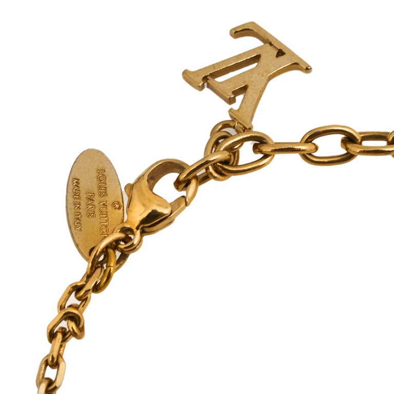 Louis Vuitton Gamble Crystal Gold Tone Dangle Earrings at 1stDibs