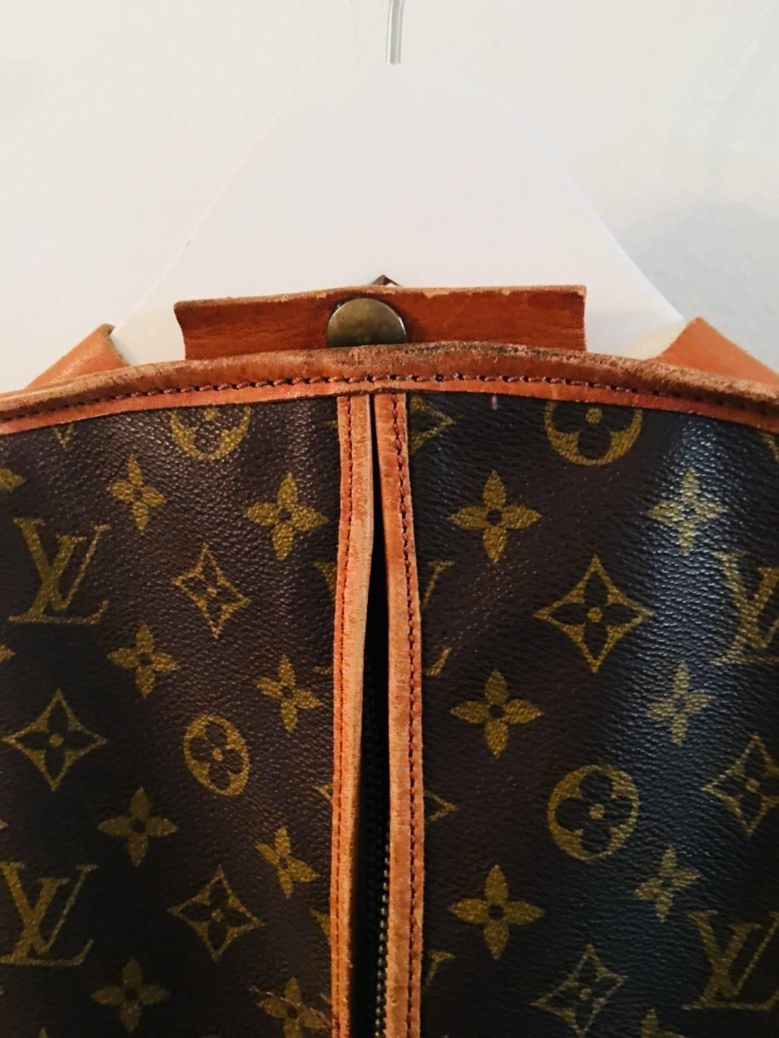 Louis Vuitton Garment Bag. Vintage with Monogram Logo Print. Leather. 
Note all Photos- Some Piping has damage from use.