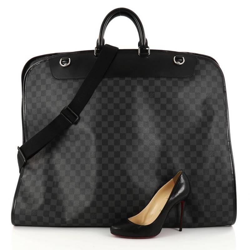 This authentic Louis Vuitton Garment Cover Damier Graphite 2 Hangers is a functional and sophisticated accessory to store all your wardrobe and travel necessities. Constructed in Louis Vuitton's damier graphite coated canvas, this large carrier