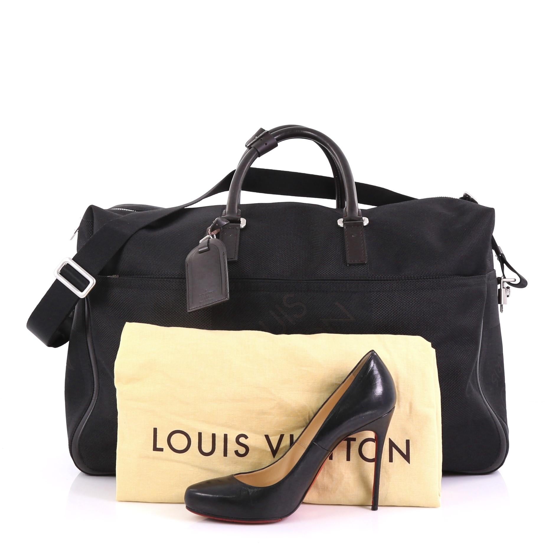 This Louis Vuitton Geant Albatros Duffle Bag Limited Edition Canvas, crafted from black damier geant canvas, features dual leather handles, leather trim, exterior front zip pocket, and silver-tone hardware. Its two-way zip closure opens to a brown