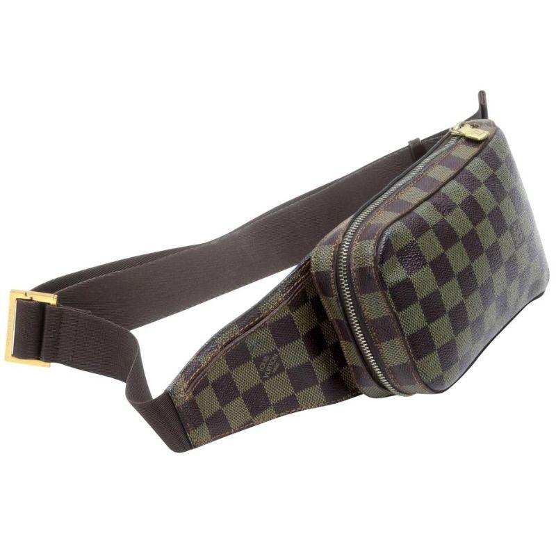Louis Vuitton Géronimos Damier Ébène Canvas Crossbody Bag LV-0204N-0009

The Louis Vuitton Damier Canvas Geronimos Hip Bag is perfect for travel or running errands. This versatile bag features an adjustable canvas strap that fits snugly on the