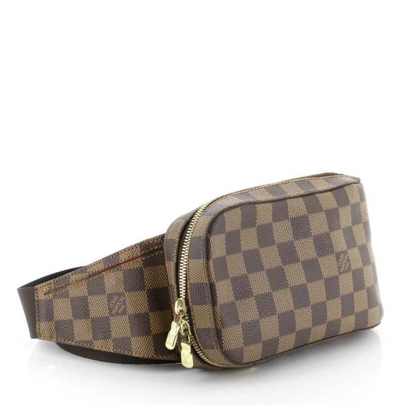 This Louis Vuitton Geronimos Waist Bag Damier, crafted from damier ebene coated canvas, features an adjustable canvas belt strap and gold-tone hardware. Its zip closure opens to a brown fabric interior. Authenticity code reads: CA1013. 

Estimated