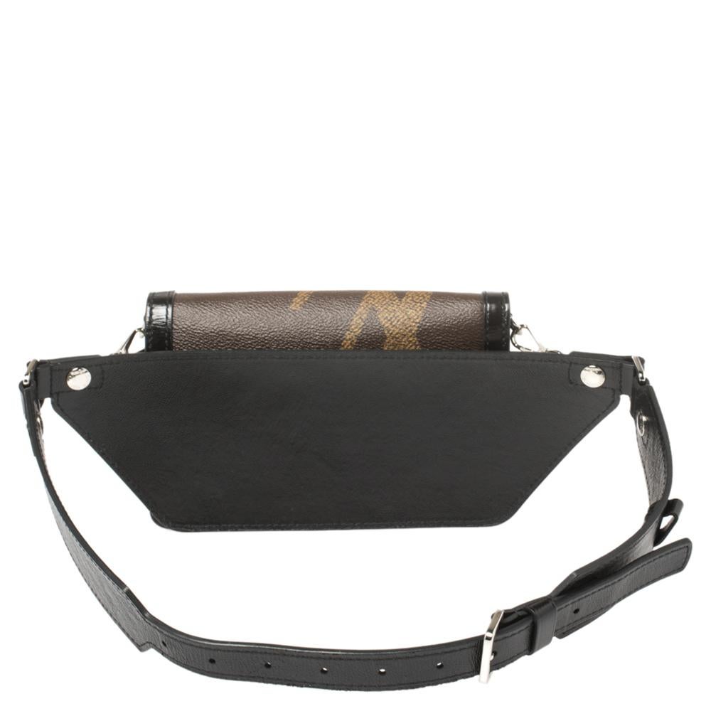 Fashioned in giant reverse Monogram canvas and signed with an LV metal logo accent on the front, this Bumbag Dauphine is contemporary and chic. Wear it as a belt bag, or cross-body for a stylish look.

Includes: Original Dustbag, Detachable Leather