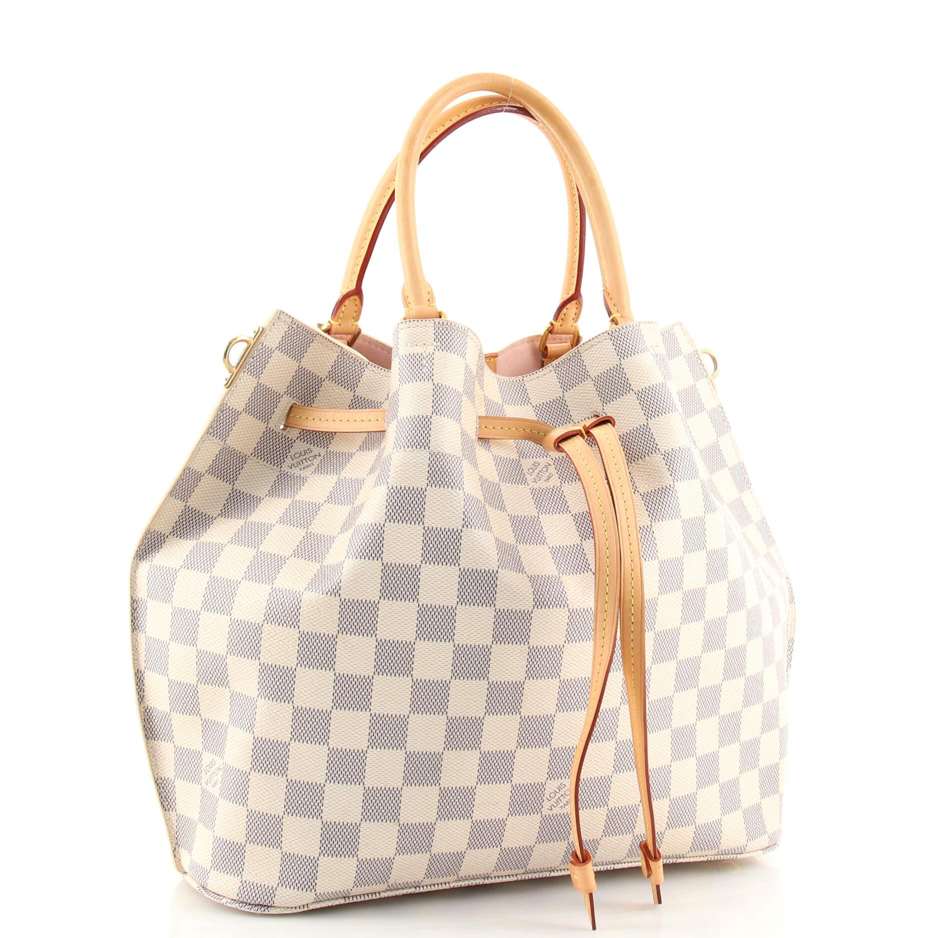 Condition: Very good. Odor in interior. Wear on base corners, darkening, wear and marks on handles, strap and leather trims, wear and darkening in interior, scratches and minor discoloration on hardware.
Accessories: With Strap
Measurements: Handle