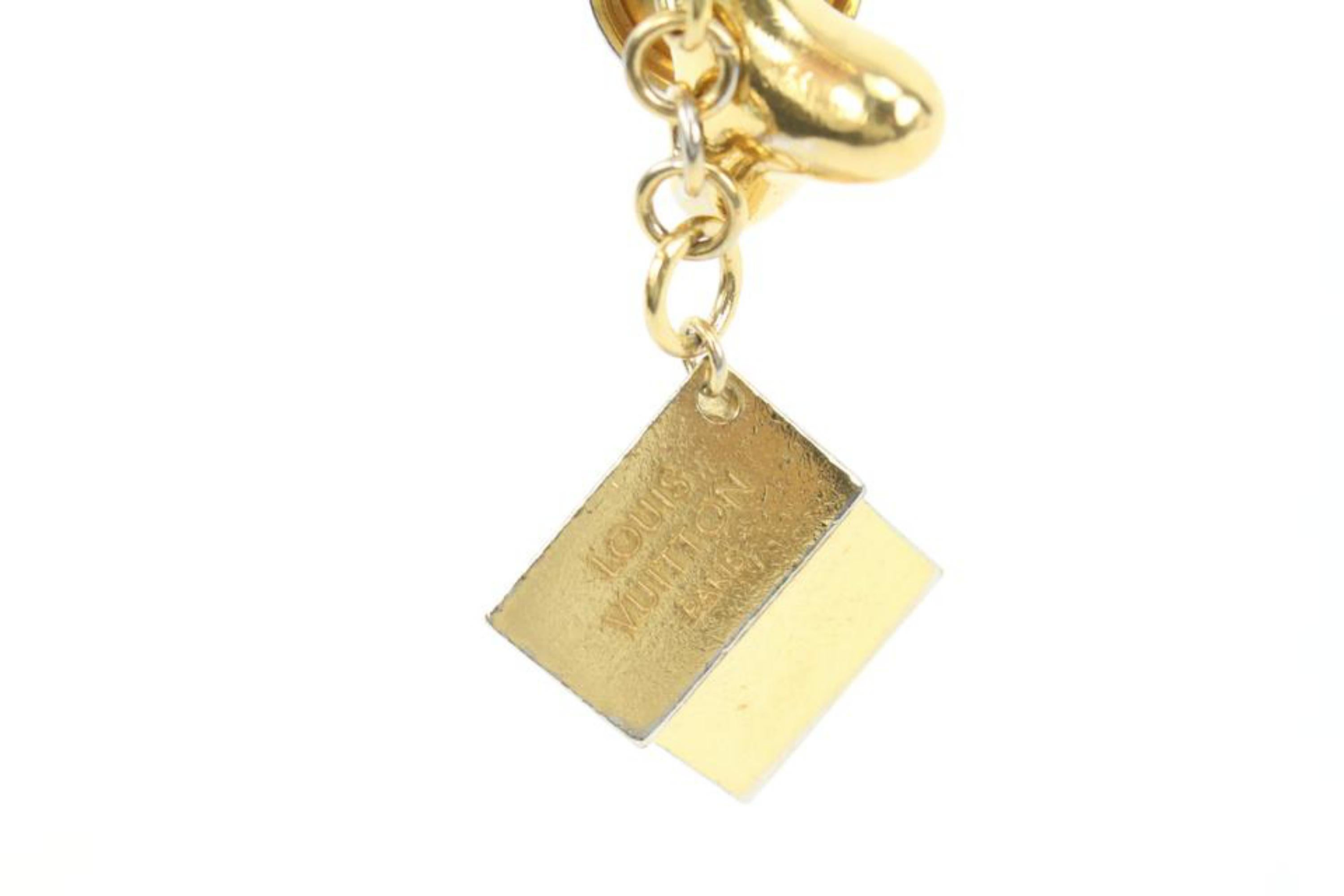 Louis Vuitton Gold Bijoux Sac Baxter Keychain Bag Charm Dog Bone 47lv421s In Good Condition In Dix hills, NY