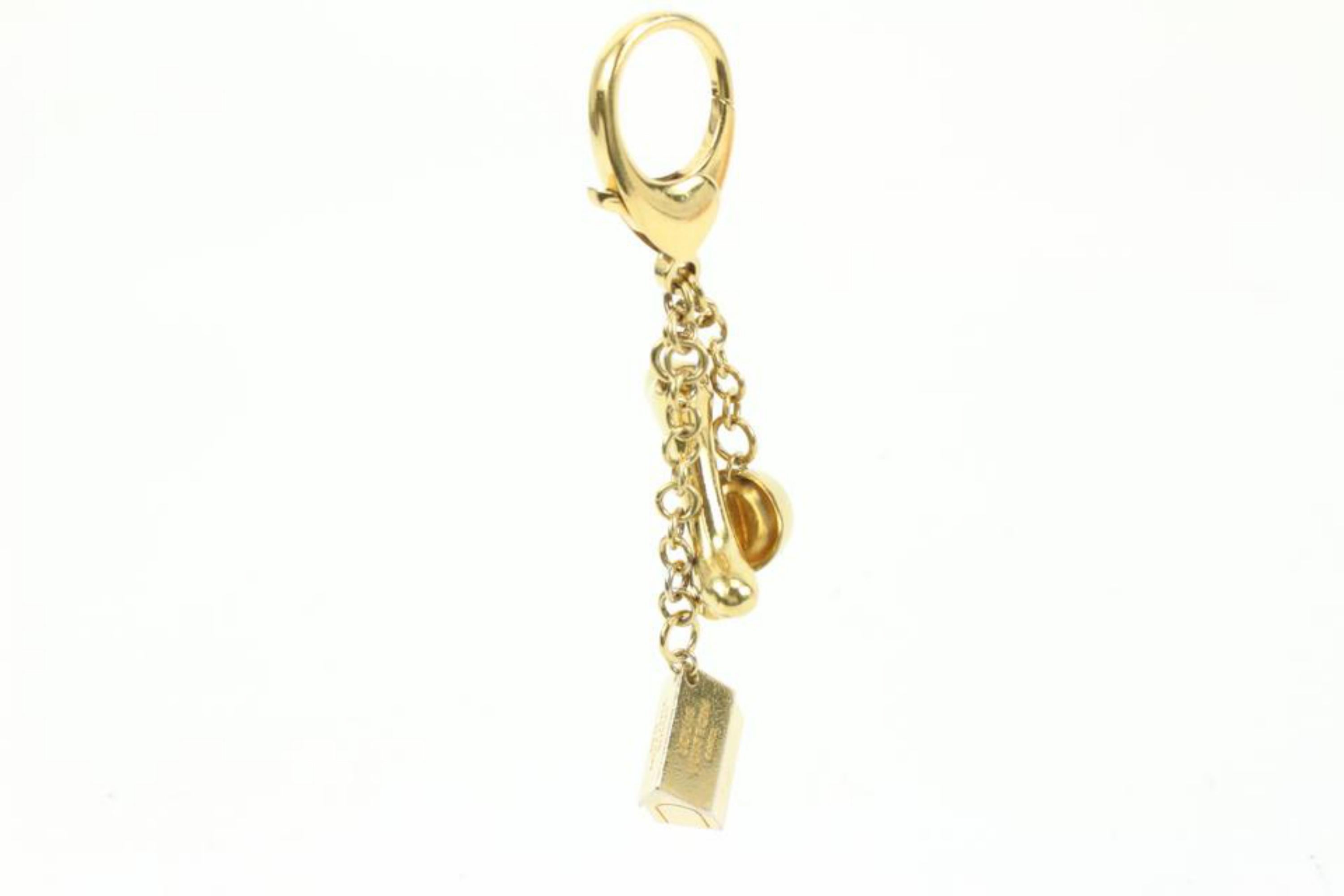 Louis Vuitton Gold Bijoux Sac Baxter Keychain Bag Charm Dog Bone 47lv421s 1