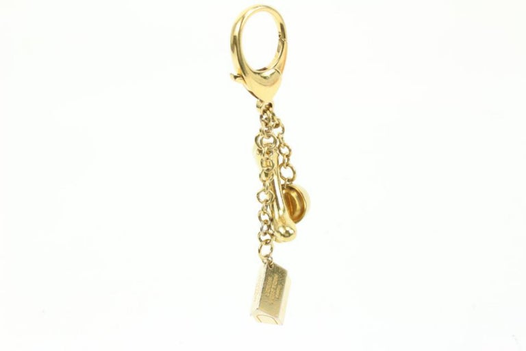 Louis Vuitton Gold Bijoux Sac Baxter Keychain Bag Charm Dog Bone 47lv421s  at 1stDibs